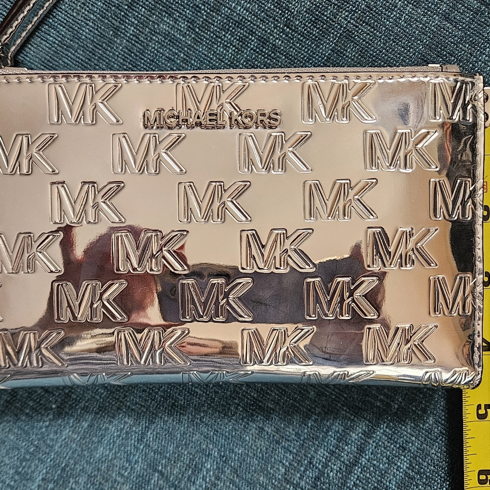 Michael Kors Silver Metallic Embossed Wristlet/wallet